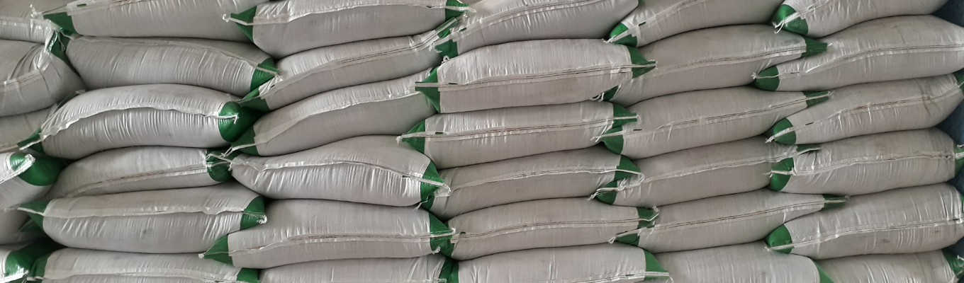 Stacks of 50-pound bags of fertilizer